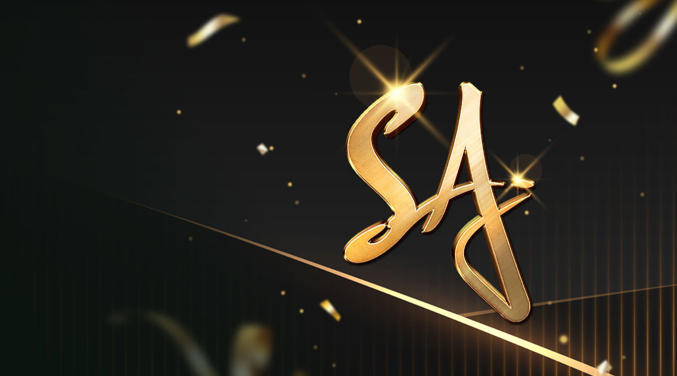 A stylized logo for 'SA Gaming' featuring the letters 'SA' in a shiny gold font. The logo is set against a dark background with subtle sparkles and light effects, creating an elegant and luxurious appearance.